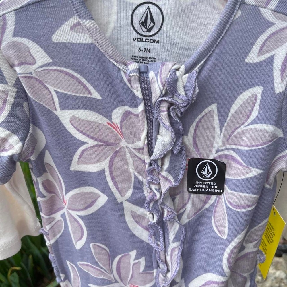 Volcom purple floral bodysuit with ruffle details